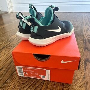 New in box. Nike flex runner kids size 8c.